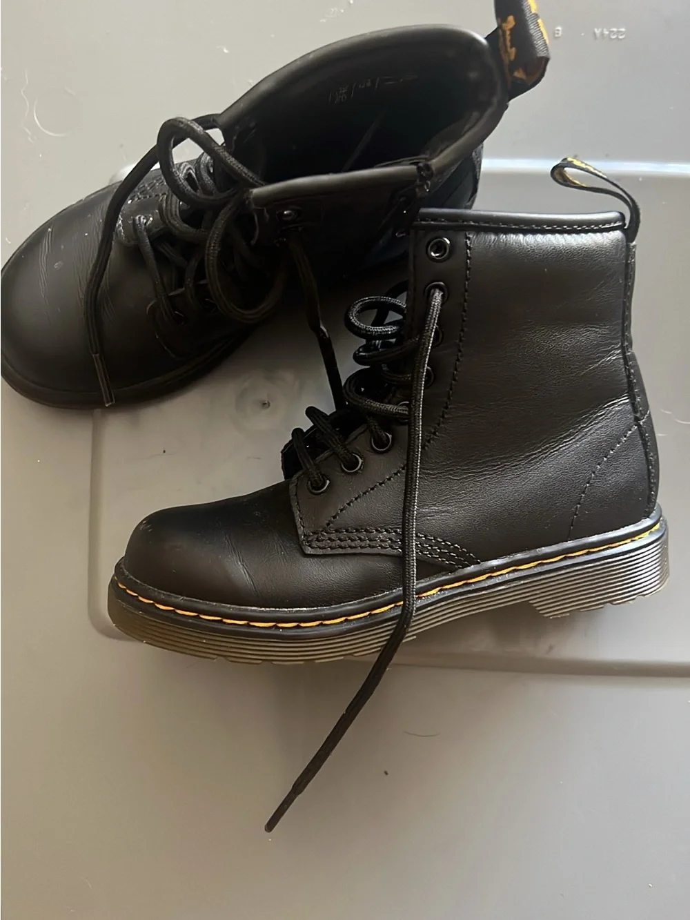 Dr. Martens Junior 1460 Black Leather Lace-Up Boots with Yellow Stitching